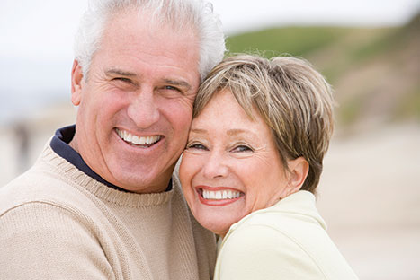 Photo of a man and woman smiling for a picture. Link to Life Stage Gift Planner Ages 45-65 Situations.