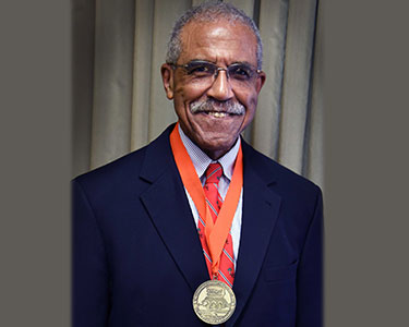 Photo of a person at a society event